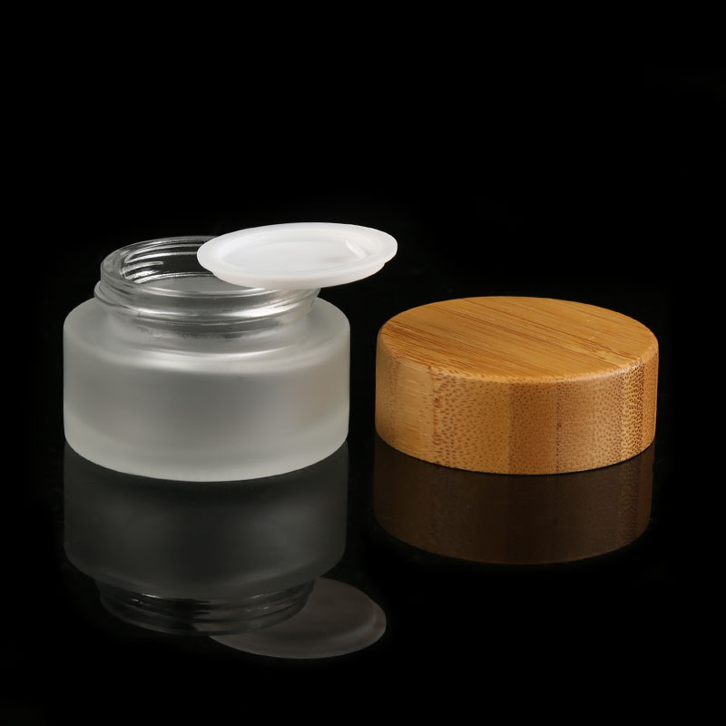 glass cosmetic jar with bamboo cap